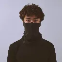 vaga-jersey-midweight-neck-gaiter-black-model-front.webp